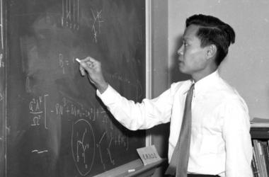 Chen Nin-Yang writes at a blackboard