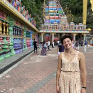 Gracie Johnson poses with colorful architecture